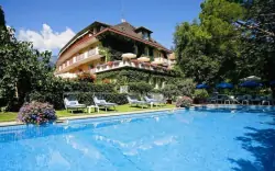 Letnie wakacje w Merano: Hotel Juliane **** z obiadokolacją, wellness i zniżką na golf i do łaźni termalnych